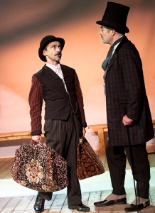 80-s-Simon Gregor (Passepartout) and Robert Portal (Phileas Fogg) in Around The World in 80 Days at St. James Theatre. Photo Simon Annand